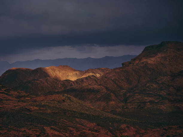 istock Sunlight on one part of mountain range. 2182086358
