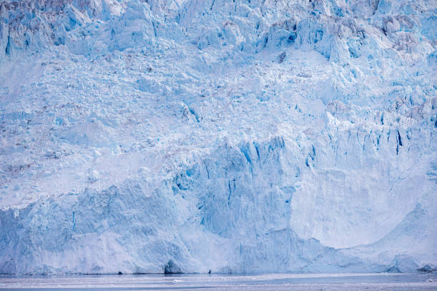 The impressive ice wall of the Eqi Glazier outside Ilulissat in western Greenland which is an UNESCO World Heritage Site due to the Ice Fjord