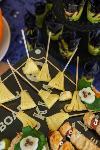 istock Halloween-themed catering served on a table at a costume party 2182092644