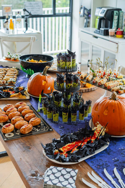 istock Halloween-themed catering served on a table at a costume party 2182092763