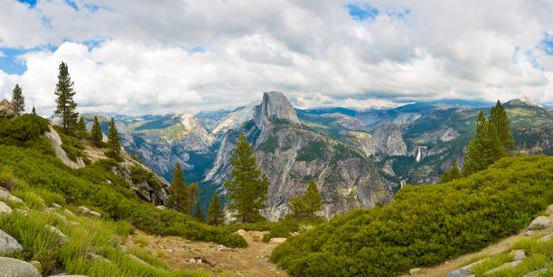 Scenic panoramic view of famous Yosemite Mountains; Half Dome from the Glacier point view - Yosemite National Park - California - USA
