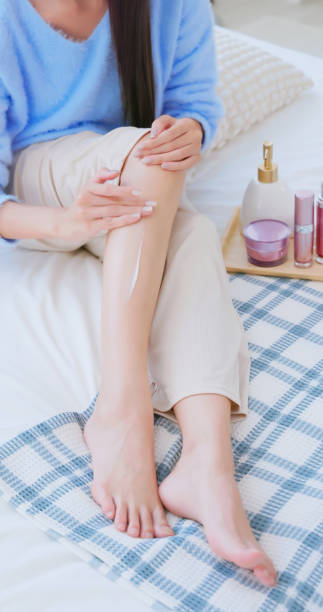istock asian female fall skincare leg 2182101098
