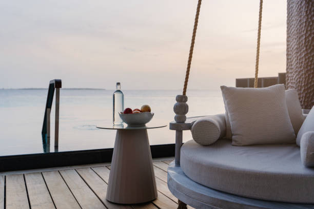 Luxurious Outdoor Lounge with Ocean View at Sunset