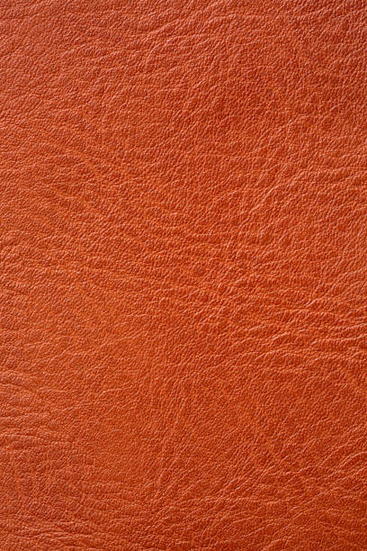 istock Brown synthetic leather macro background,Synthetic leather brown background texture. Brown leather textured background. 2182107982