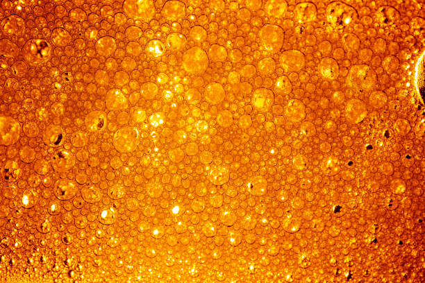 istock Macro beer foam background,pouring beer with bubbles for background on front view wave shape texture foam 2182108031