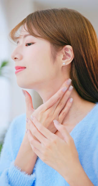 istock asian woman satisfied neck skin 2182108574