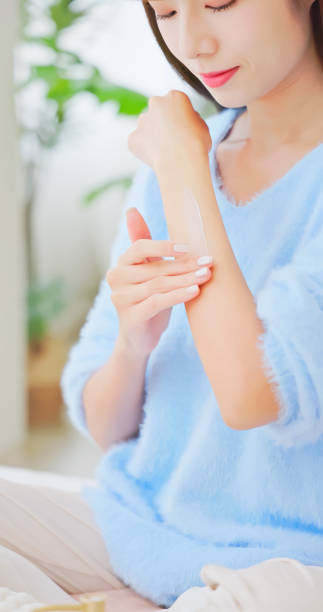 istock asian woman satisfied hands skin 2182108606