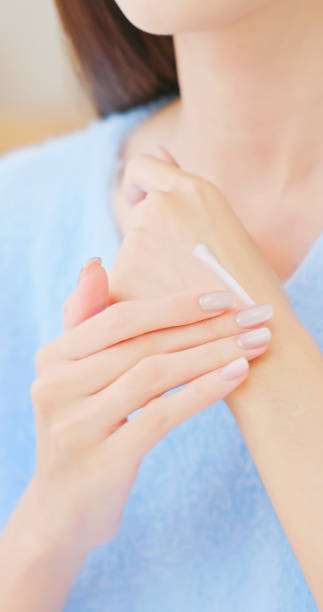 istock asian woman satisfied hands skin 2182108648