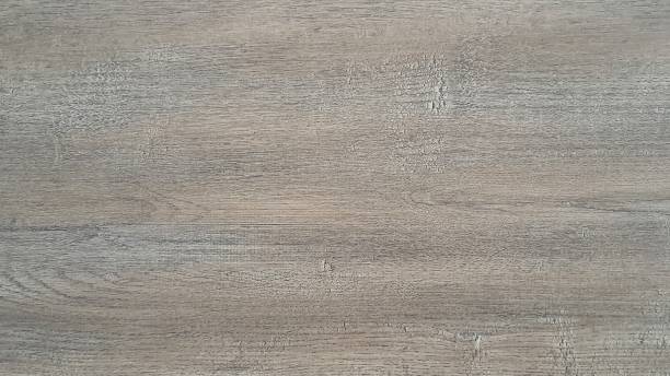 istock Wood texture background surface with an old natural design. Brown wood-textured, scratched wizard. 2182112111
