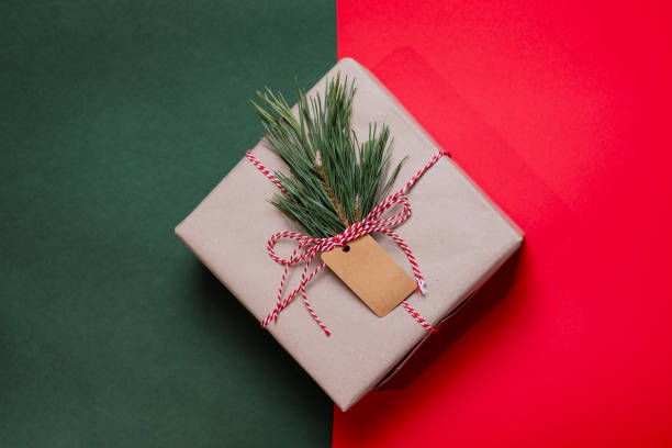 istock Christmas gift on red and green background 2182112656