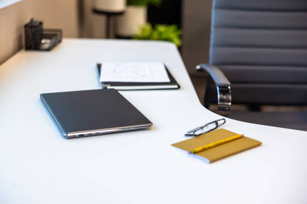 istock Chair and desk in an office 2182117874