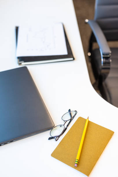 istock Flat Lay Overhead Desk in an office with supplies on it 2182118994