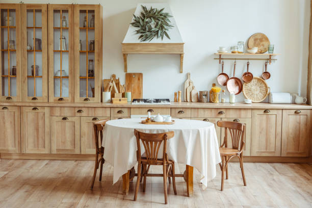 Bright and airy farmhouse kitchen with round dining table