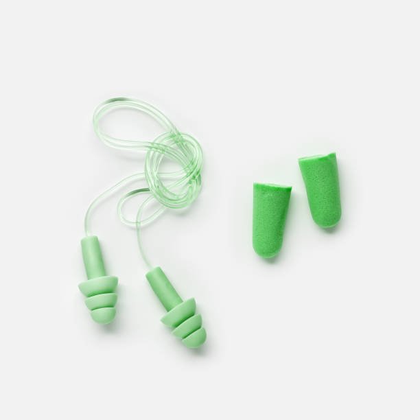 istock Different earplugs on white background, comfort silicone and rubber ear plug on string protection against noise, protect hear, for swim, sleep, comfort rest. Top view flat lay photo, design 2182121508