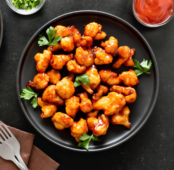 istock Sweet chili cauliflower wings on plate 2182123202