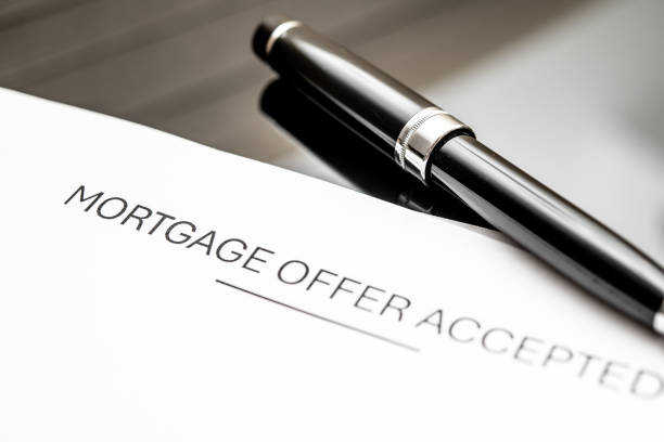 istock Mortgage Offer Accepted Document with Elegant Pen on Modern Desk Highlighting Real Estate Transactions and Financial Approval in Home Buying Process 2182124689