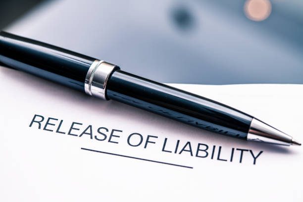 istock Professional Liability Release Document Signed with Elegant Black Pen for Legal and Business Purposes 2182124799