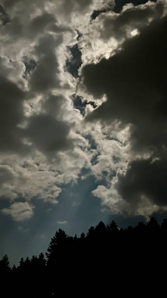 istock Night landscape, full moon behind clouds in the sky 2182127469