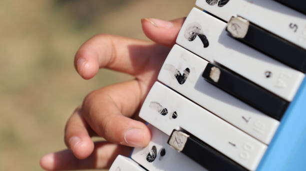 istock Close up Hand playing pianica 2182129280