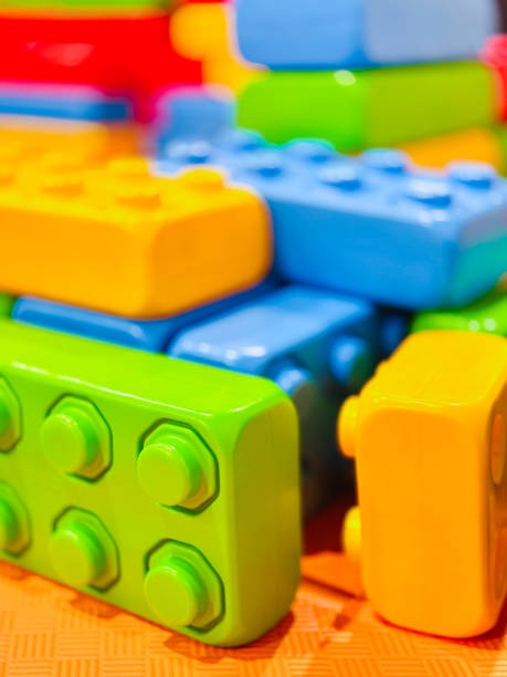 This image showcases a vibrant assortment of colorful building blocks, meticulously stacked and arranged in an array of hues.