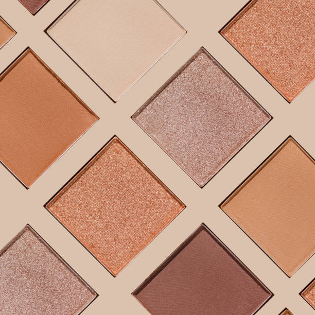 istock Cosmetics texture pattern, makeup palette vivid neutral color eye shadow, square eye powder swatches. Female cosmetic and beauty products, aesthetic minimal beauty photo, colorful eyeshade, top view 2182135329
