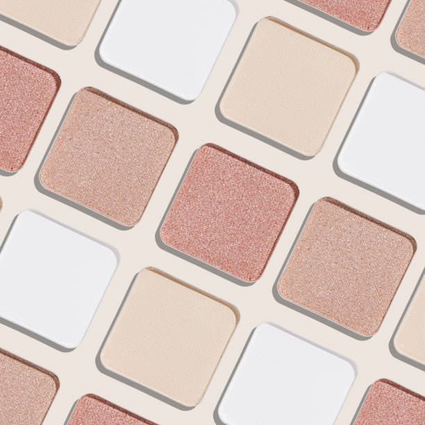 istock Swatches eyeshadow refills as minimal monochrome pattern. Matte and glitter pans white beige pink shades, detailed texture, sun light, stylish cosmetics background, beauty product, eye makeup 2182135355