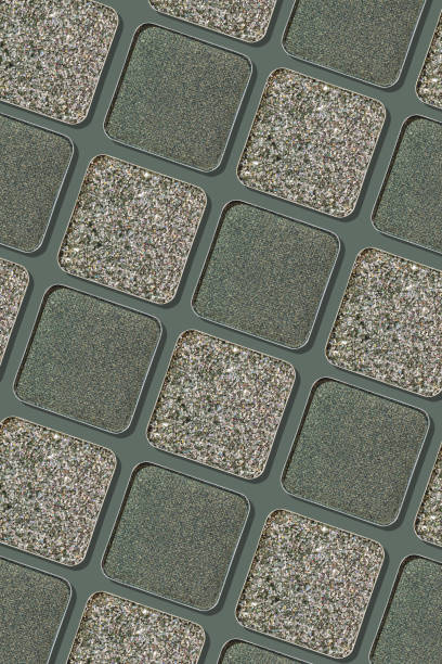 istock Swatches eyeshadow refills as minimal monochrome pattern. Matte and glitter pans dark green grey shades, detailed texture, natural light, stylish cosmetics background, beauty product, eye makeup 2182135358