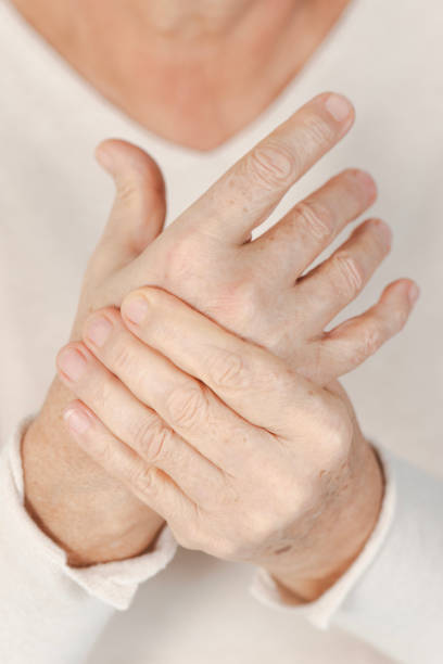 istock Elderly Hands in Pain 2182135359