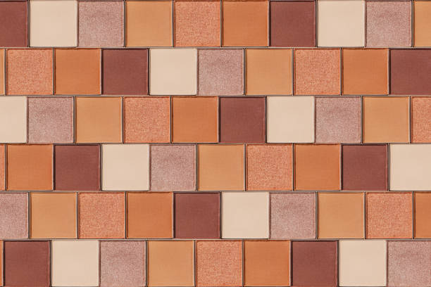 istock Cosmetics texture pattern, makeup palette vivid neutral color eye shadow, square eye powder swatches. Female cosmetic and beauty products, aesthetic minimal beauty photo, colorful eyeshade, top view 2182135364