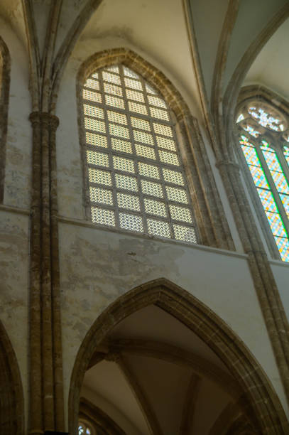 istock A serene moment inside an ancient cathedral with beautiful stained glass and towering arches during daylight 2182141417