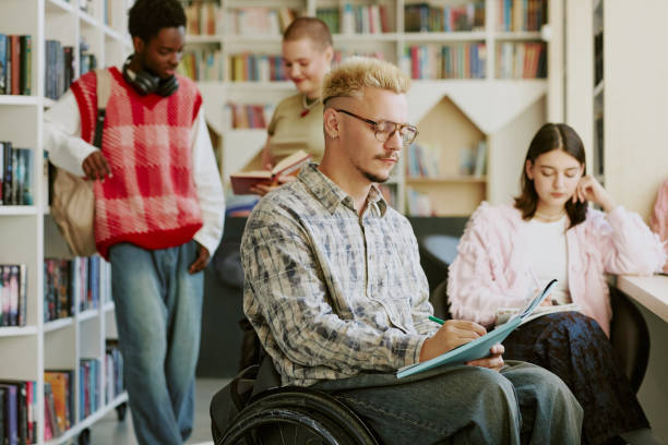istock Studying Together in Library with Group of Friends 2182142144