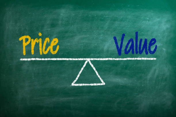 istock Drawing Value and Price balance scale on the chalkboard 2182146934