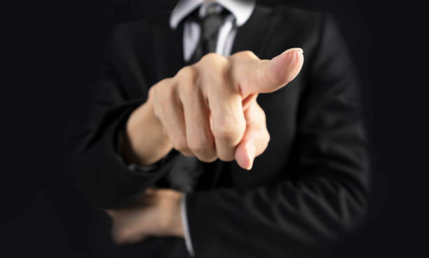 istock Businessman in black suit showing hope and confidence in work and project 2182149574