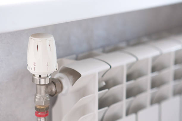 istock Upgrade your homes comfort with a modern heating radiator featuring advanced thermostat control 2182152281