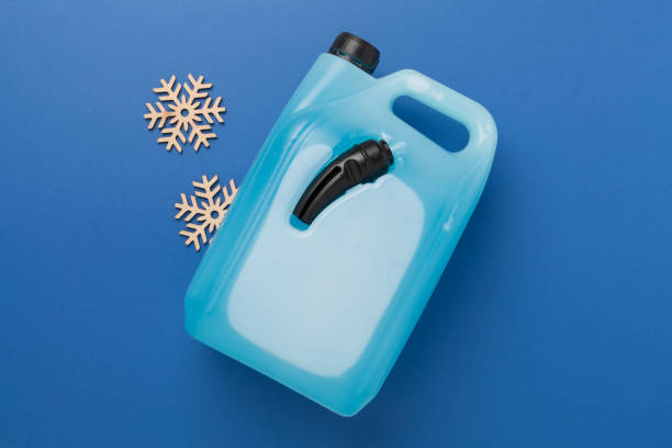 istock Can with antifreeze on color background, top view 2182152439