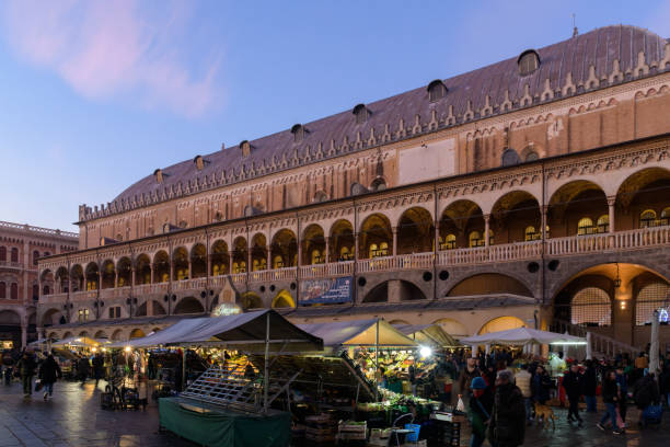 Padua, Italy - January 22th 2024: Palazzo della Ragione in seen From Piazza delle Erbe, a medieval market and town hall and palace of justice. Padova