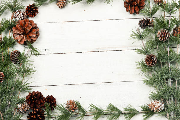 istock New year's theme on white surface with fir branches. Design for greeting card. 2182157382