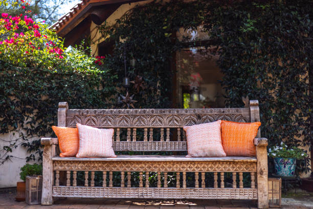 istock Carved Wooden Bench by Ivy Wall 2182157822