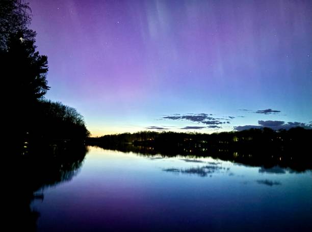 istock Enchanting Northern Lights Over Lake 2182159132