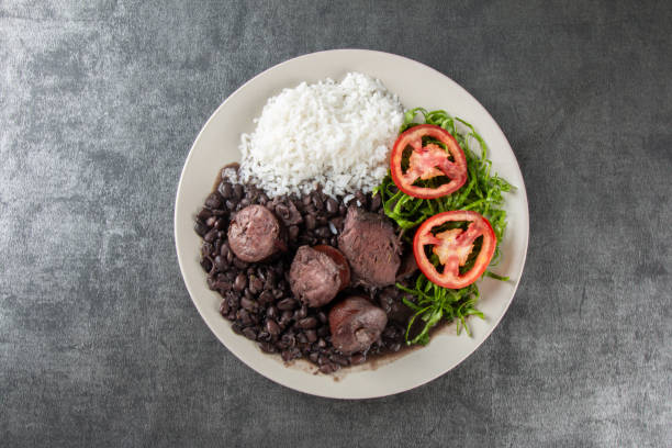 istock Plate with traditional Brazilian Feijoada with a gray background 2182160609