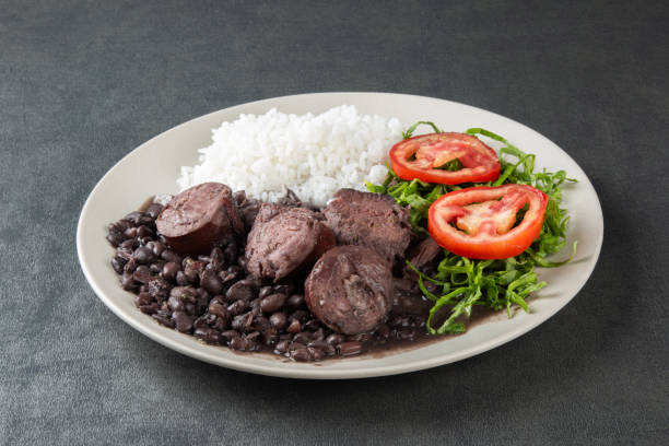 istock Plate with traditional Brazilian Feijoada with a gray background 2182160614