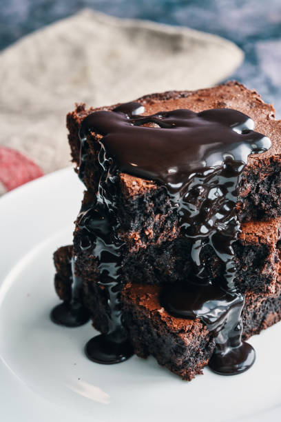istock Chocolate Brownie Served with Chocolate Sauce 2182161129