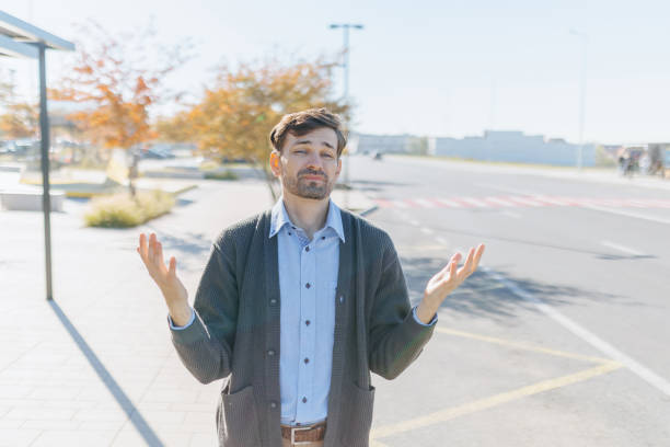 istock Upset Man Looking Away While Waiting at City Station 2182161936