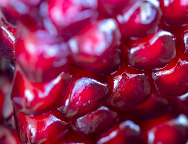 istock pomegranate fruit, pomegranate seeds, macro 2182164560