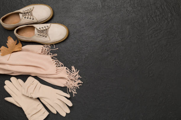 istock Stylish autumn accessories on cocrete background, top view 2182165563