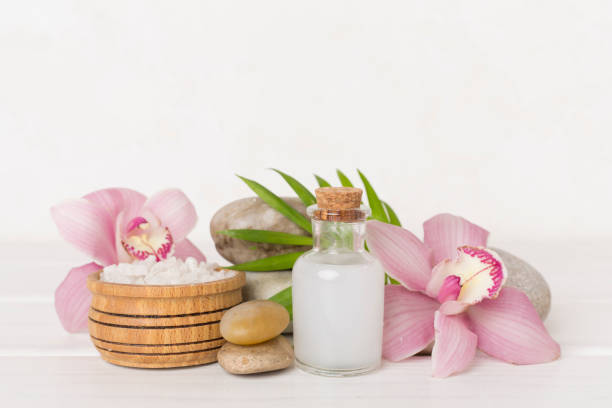 istock Composition with orchids, spa products on wooden table 2182165867