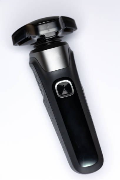 istock Beard shaver on a white background. Cutting blades protected by plastic cover. 2182168849