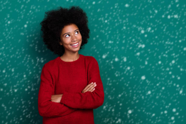istock Photo of dreamy charming small schoolgirl wear red pullover arms cheeks looking empty space isolated green color background 2182168951