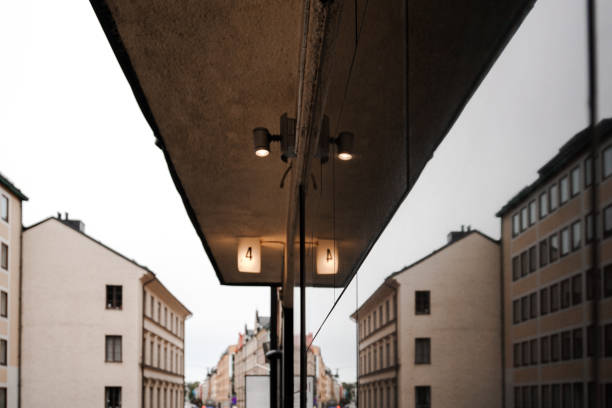 Low angle of a window with the reflection of a building