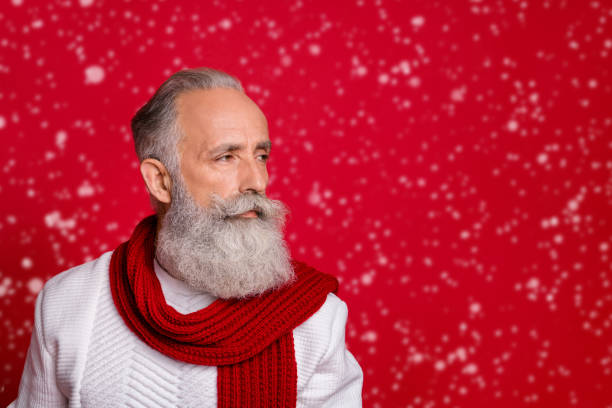 istock Close up profile side photo of gorgeous elderly man looking wearing white pullover isolated over red background 2182173236